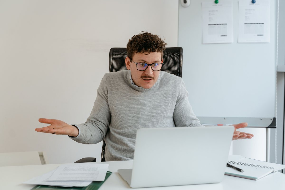 A businessperson with arms crossed forming a first impression